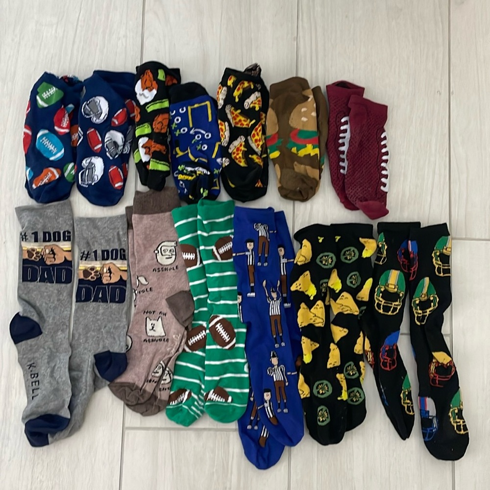 13 pairs of funny socks. Size small men’s